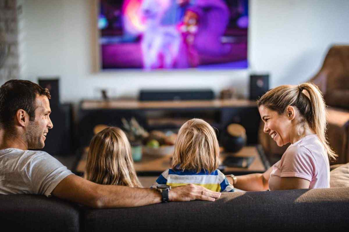 A Family Enjoying by Watching TV